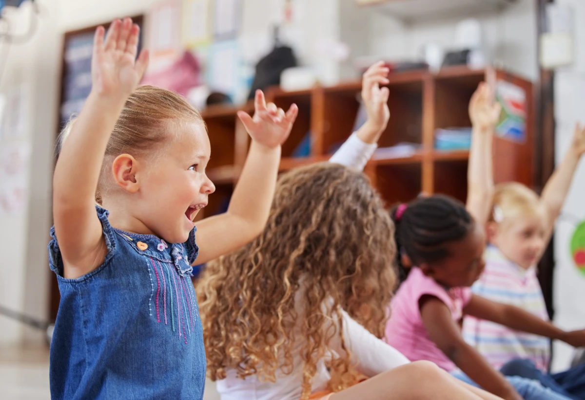 Young children expressing themselves through creative play with colourful toys and blocks